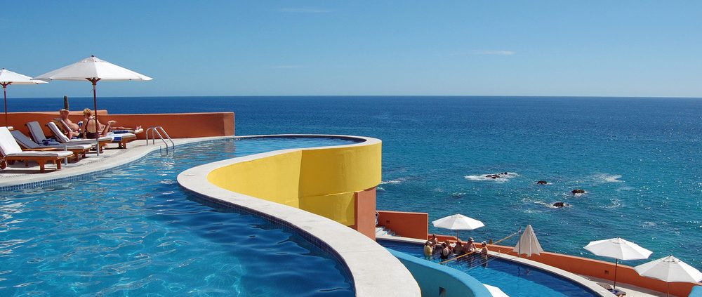 pool overlooking a beach