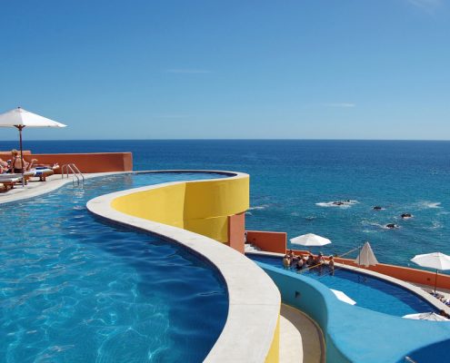 pool overlooking a beach